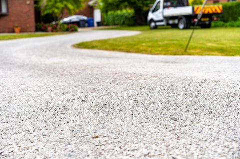 asphalt resurfacing with surface dressing and tar and chipping